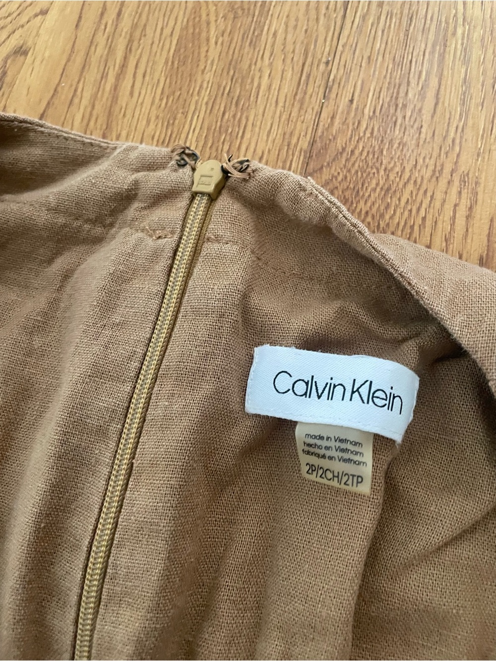 Calvin Klein Sleeveless V-Neck Wide-Leg Jumpsuit in Camel - Picture 5 of 8